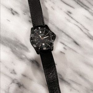 Victorinox Swiss Army watch with black leather band